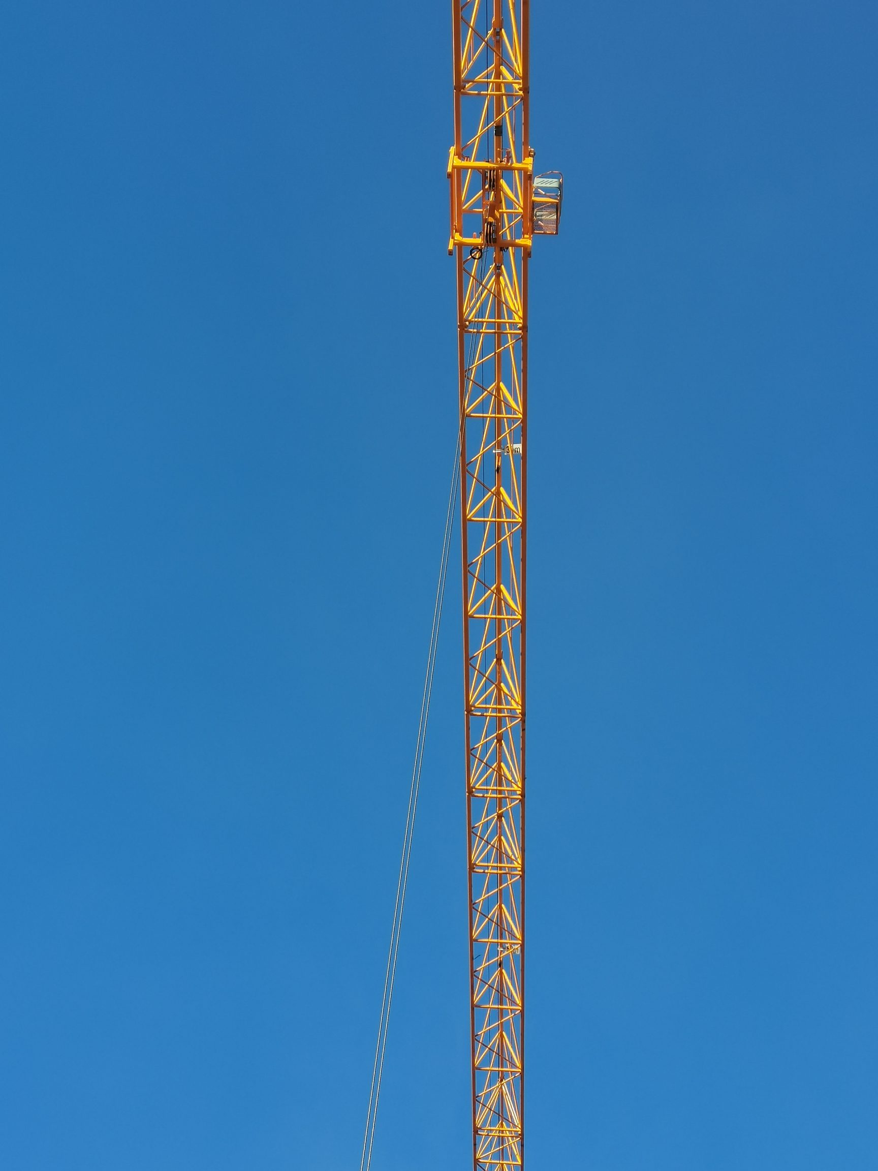 广州修建取得一种塔吊附着加固结构专利提高施工的稳定性